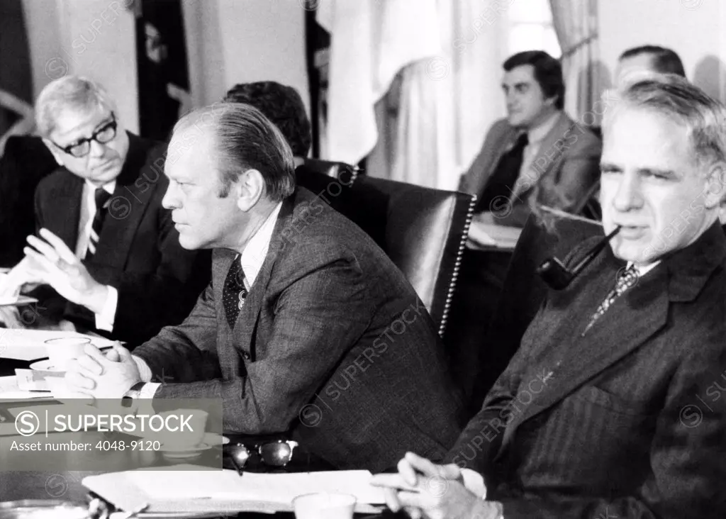 President Gerald Ford in a Cabinet meeting six days before his first State of the Union Address. L-R: Rogers Morton, Interior Secy, President Ford, James Schlesinger, Defense, Secy.