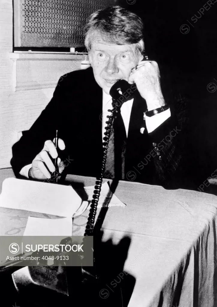 Georgia Governor Jimmy Carter, talking on the telephone during his Democratic Primary campaign. April 12, 1976.