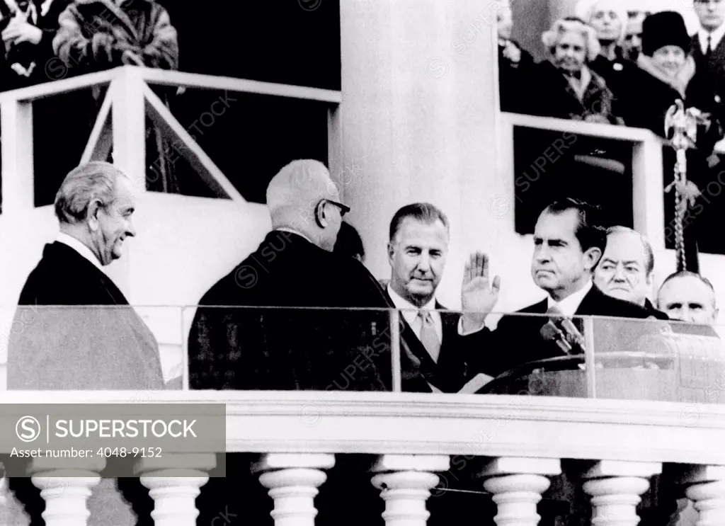 Inauguration of Richard Nixon. L-R: Outgoing Pres. Lyndon Johnson, Chief Justice Earl Warren, Vice Pres. Spiro Agnew, Nixon, outgoing Vice Pres. Humphrey, and Senate Majority leader Mike Mansfield. Jan. 20, 1969.