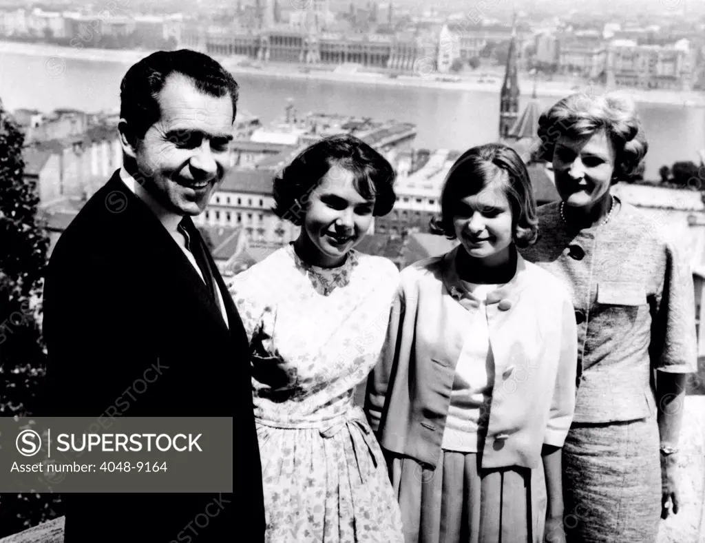 Richard Nixon and his family in Budapest, Hungary. L-R: Former Vice Pres. Nixon, Julie Nixon, Tricia Nixon, Pat Nixon. July 26, 1963.