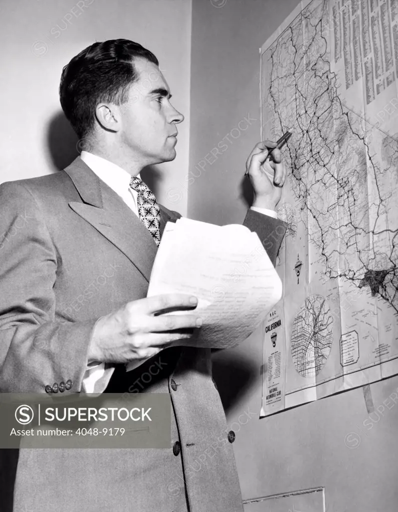 Representative Richard Nixon studies his campaign map during his campaign for Senator. Nov. 6, 1950.