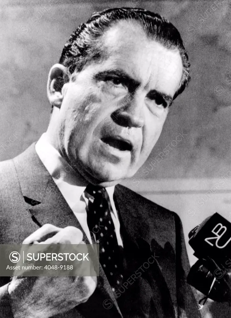 Republican presidential candidate Richard Nixon speaking with a clenched fist on April 20, 1968. He pledged he 'would not join the parade of candidates offering billion dollar programs to solve social problems, even if it costs me the election'.