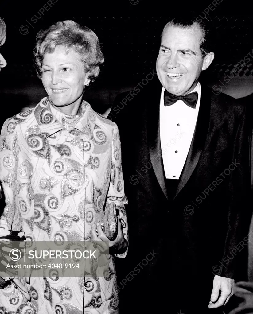 Pat Nixon winks at a friend. She and her husband, GOP presidential nominee, Richard Nixon, are attending a $1000-a-plate GOP dinner at Americana Hotel. Sept. 20, 1968.