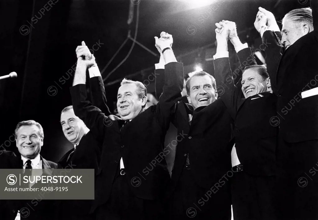 Republicans display unity for Nixon.Former rivals  line up to support him at a Madison Square Gallery rally. L-R: Gov. Nelson Rockefeller, VP candidate Spiro Agnew, Gov. James Rhodes of Ohio, Richard Nixon, Gov. John Volpe, and Gov. George Romney. Oct. 31, 1968.