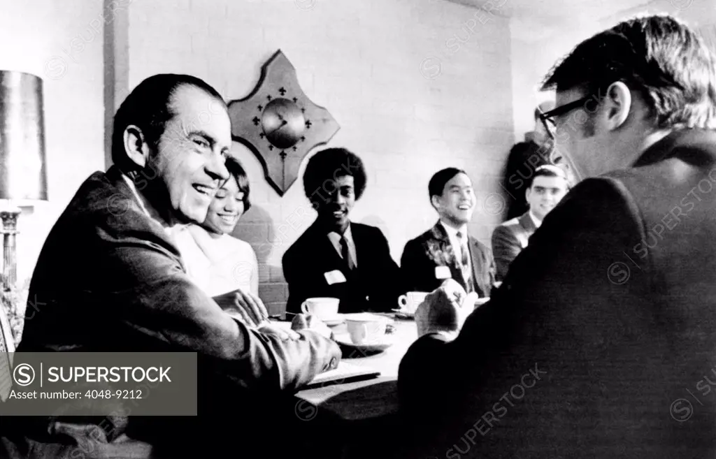 President Richard Nixon meets young people who have served on experimental youth advisory committees within the Selective Service System. The President also advocated his proposal for a shift to a lottery type draft. June 6, 1969.
