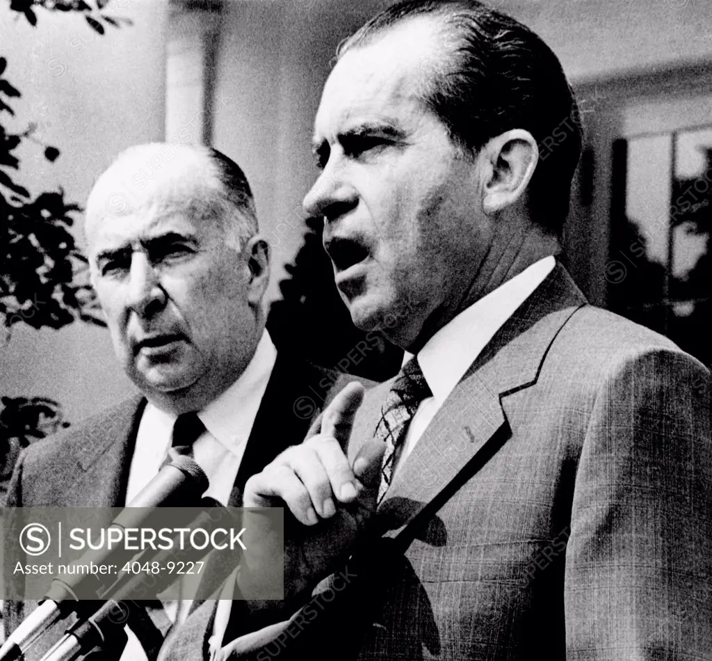 President Richard Nixon and Attorney General John Mitchell addressing a group of visiting US attorneys at the White House. Nixon criticized Congress for not yet passing his crime legislation. June 11, 1970.
