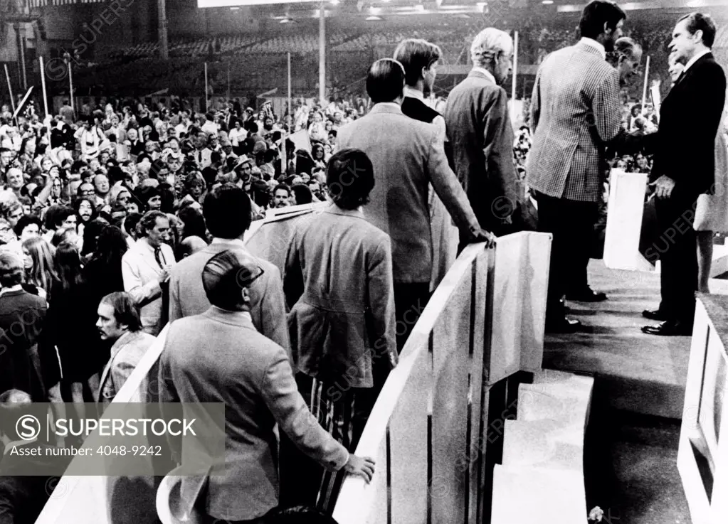 Republican Convention delegates wait to shake the hand of President Richard Nixon after his acceptance speech. Aug. 23, 1972.