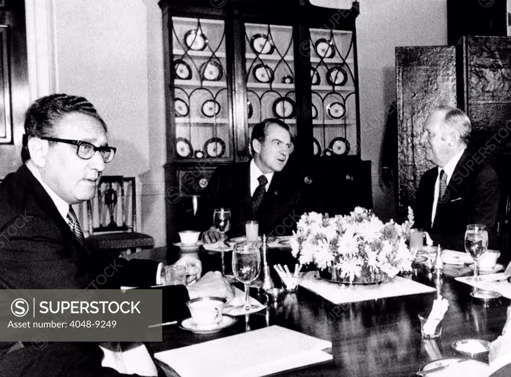 President Richard Nixon; William Rogers, Secy of State William Rogers, left; and Henry Kissinger at a breakfast meeting.  Feb. 23, 1973