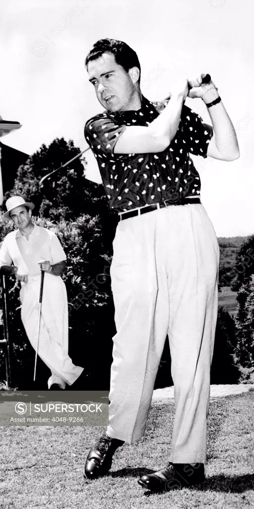 Vice President Richard Nixon golfing. He is at the first tee Greenbrier Resort's golf course on Memorial Day weekend. His golf partners included William Rogers, U.S. deputy attorney general. May 23, 1953.