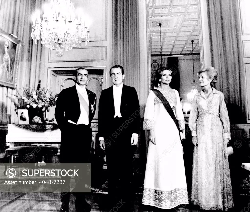President Richard and Pat Nixon at the Shah's Niavaran Palace. L-R: Shah of Iran, the Empress Farah Diba, Nixon, and Pat Nixon at a state banquet. May 30, 1972.