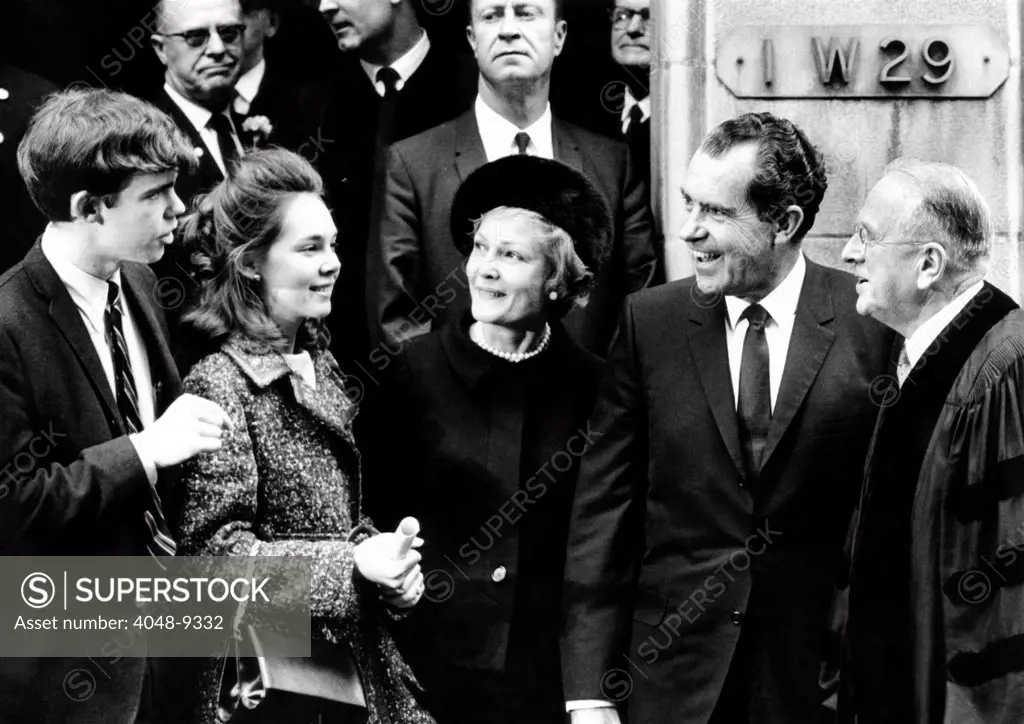 President-elect Richard Nixon and his family with Dr. Norman Vincent Peale. L-R: David Eisenhower, Julie Nixon, Pat Nixon, Richard Nixon, and Dr. Peale. The next month, David and Julie married at the Marble Collegiate Church by Peale. Nov. 24, 1968.