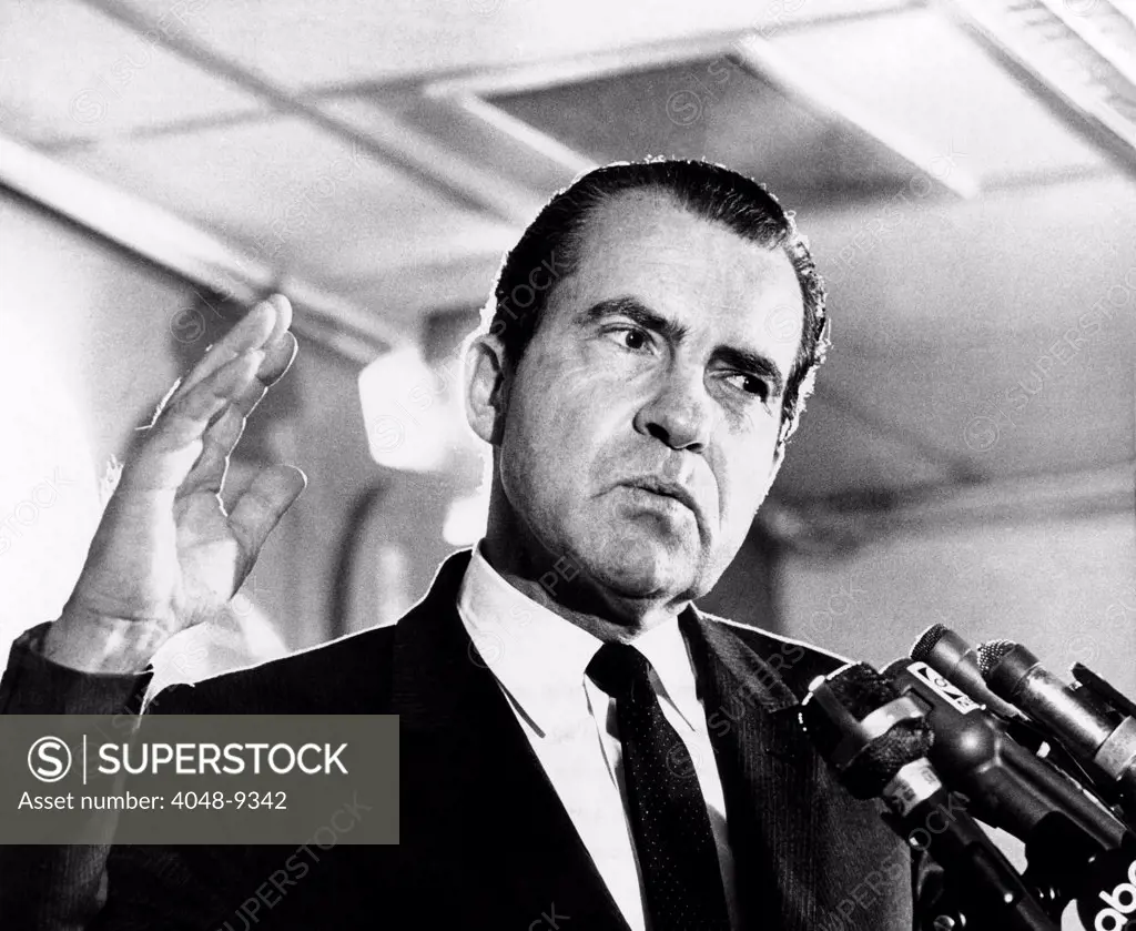 Former Vice President Richard Nixon during airport news conference on his return from Latin America. Nixon previously made 'fact-finding' tours of western Europe, the Soviet Union, and Southeast Asia. He would make additional tours of North Africa and the Middle East. May 16, 1967