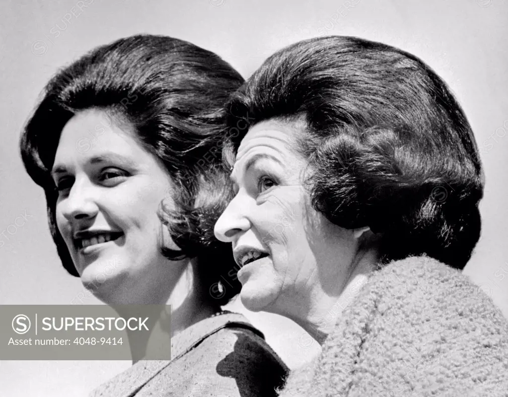 Lady Bird Johnson, the First Lady, with her oldest daughter, Lynda Bird Johnson. They were greeting delegates to the 1965 Campaign Conference of Democratic Women on the White House Lawn. May 7, 1964.