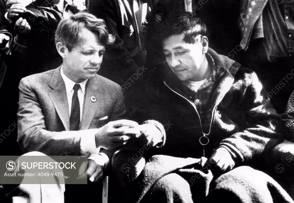 Cesar Chavez ends his hunger strike with Sen. Robert Kennedy. The leader of the United Farm Workers Organizing Committee (UFWOC) ate his first solid food in 23 days in support of non -violence in the strike against grape growers. Delano California in the San Joaquin Valley. March 10, 1968.