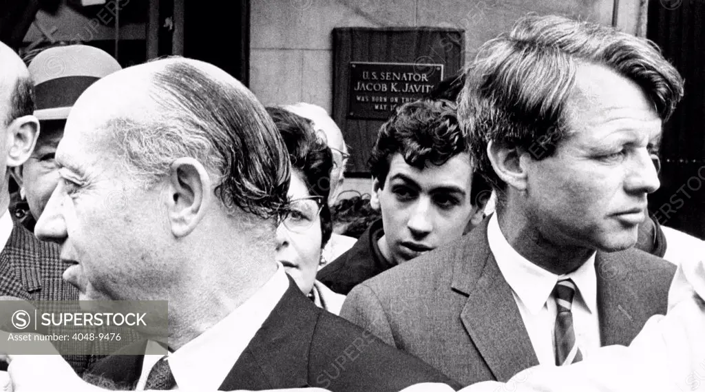 New York States two senators touring NYC's Lower East Side. Republican Jacob Javits (left) and Democrat Robert Kennedy at Javit's birthplace (plaque). May 11, 1967.