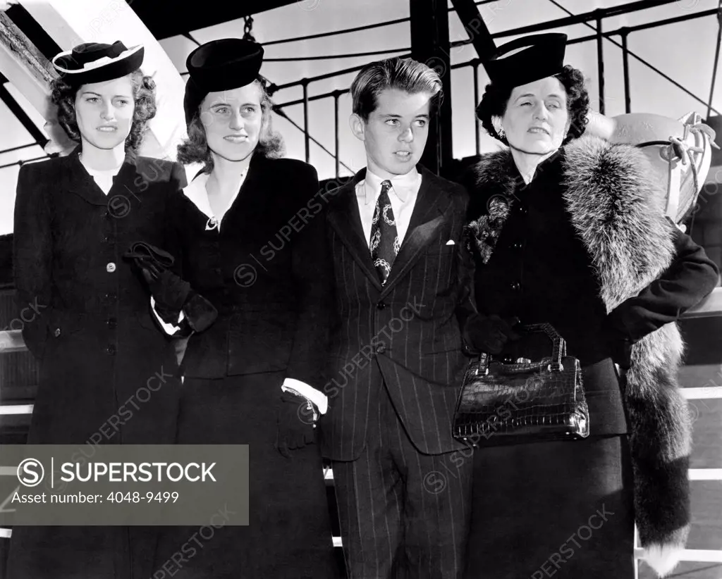 Ambassador Joseph Kennedy's wife and three children arrive in New York. L-R: Eunice, Kathleen, Robert, and Rose Kennedy. Sept. 18, 1939.