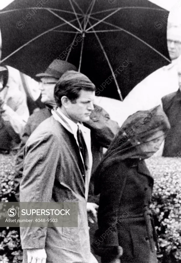 Joseph P. Kennedy funeral. Rose Kennedy leaving St. Francis Xavier Church in Hyannis following private funeral service for her husband, Joseph P. Kennedy. She is escorted by her son, Senator Edward Kennedy. Nov. 20, 1969.
