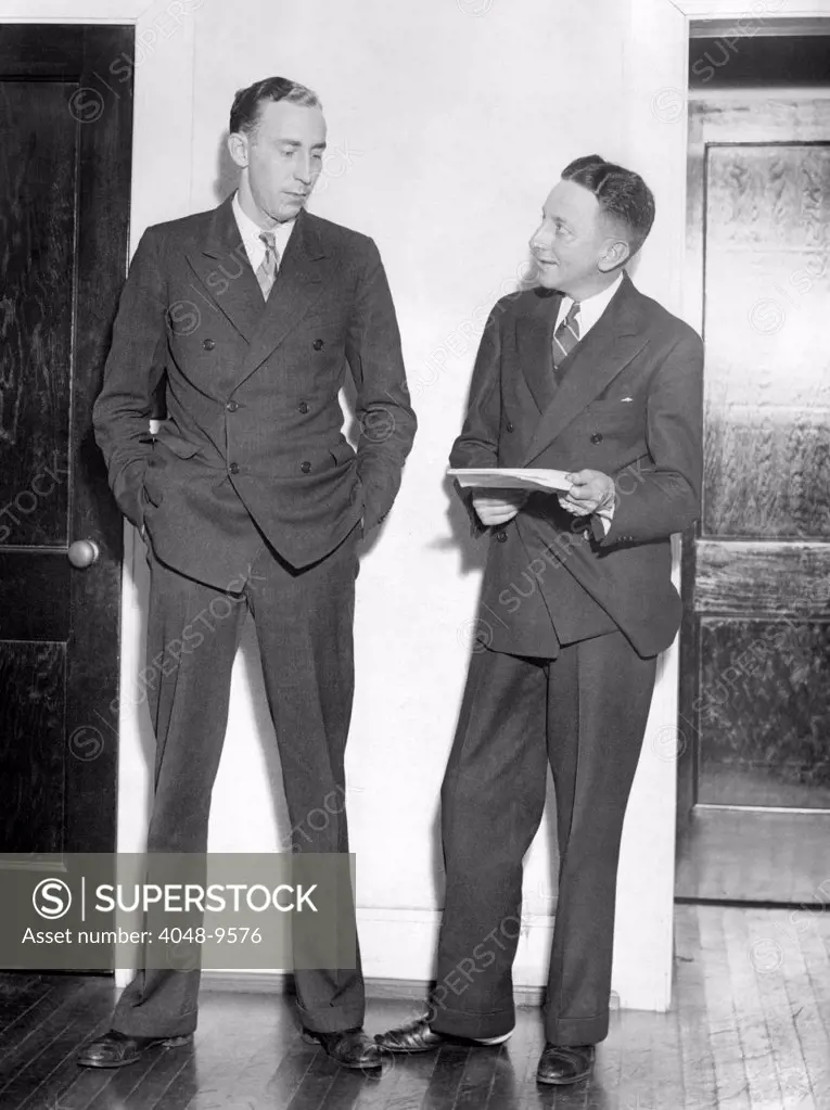 Prosecution at the Scottsboro Trial. Attorney General Thomas Knight (left) and his assistant, Thomas Lawson. They are preparing for a new trial in Decatur, Georgia, for the seven African Americans accused of sexually attacking two white girls. Nov. 24, 1933.