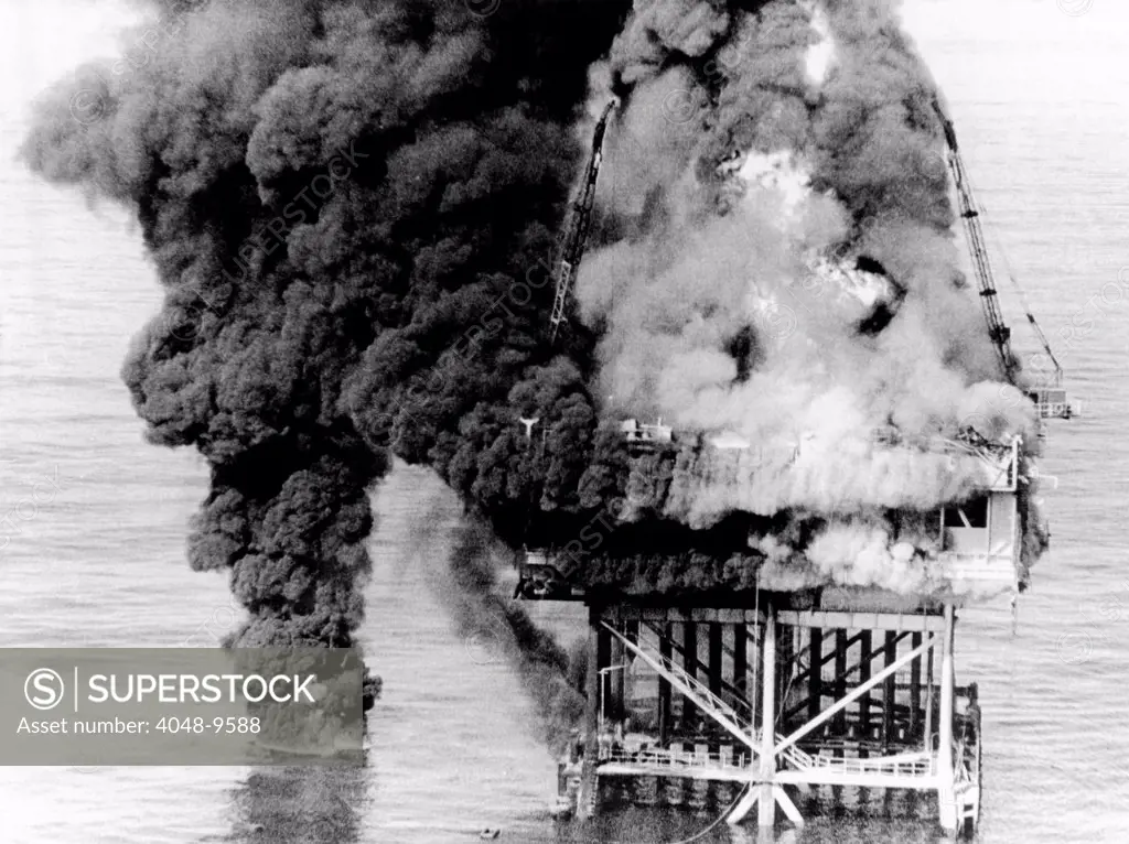 Oil platform blaze at Grand Isle, Louisiana. Two workers died by drowning when they jumped off the 70-foot-high platform to avoid the fire. Dec. 1, 1970.