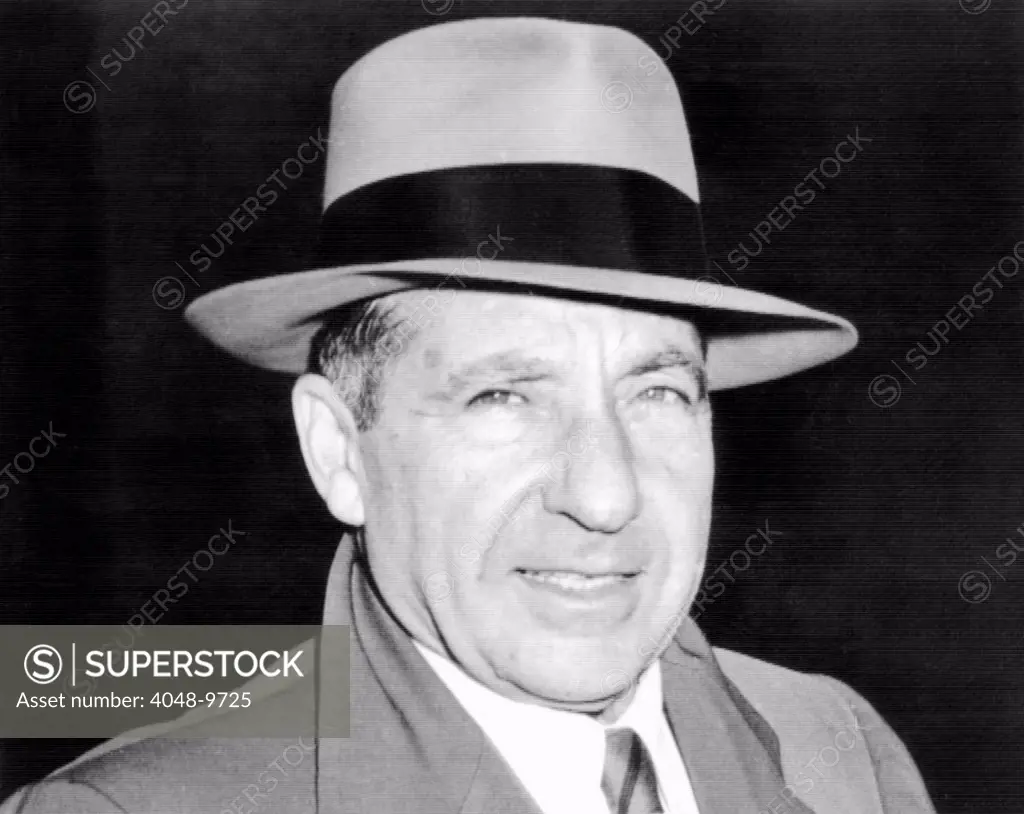 Frank Costello boss of the Genovese crime family. He is leaving New York's Federal Courts Building after a jury found him guilty of income tax evasion April 13, 1954.