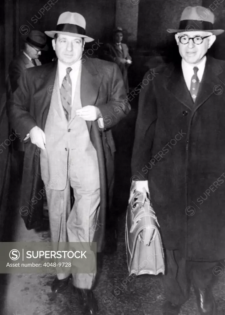 New York organized crime boss, Frank Costello (left), with his lawyer, George Wolf. They arrives at the Federal Buildings to testify at the Kefauver Crime Committee which is probing 'any inter-state political tie-ups' with the underworld. March 13, 1951.