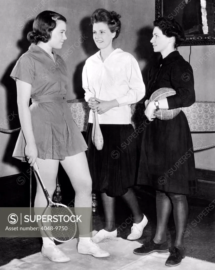 Student gym suits have changed over time. From a Barnard College exhibit: L-R: Deborah Allen wears a contemporary short skirted suit of 1939, Ingrid Bach wears bloomers from 1905, and Ruth Cummings wears a 1895 gym dress. Feb. 1939.