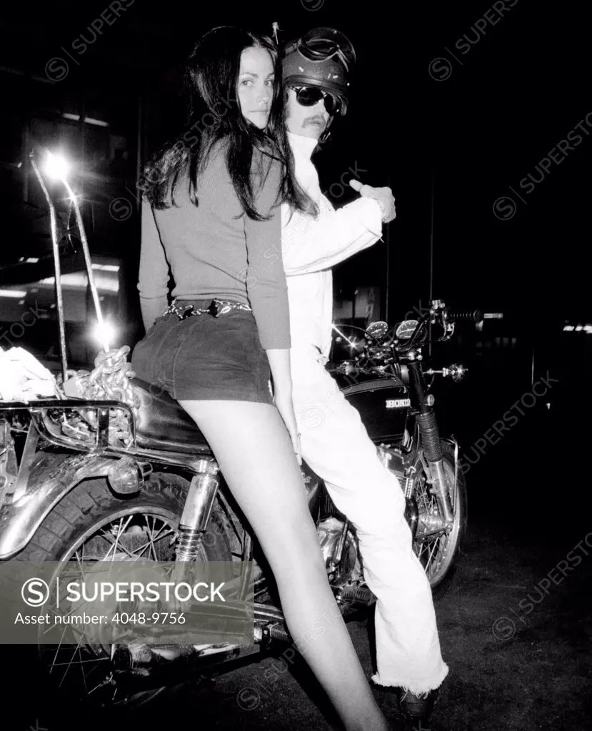 Nancy HadseII won a 'hot pants' beauty contest given as a promotion by Envoy East Restaurants. Her prize was a motorcycle ride with actor Troy Donohue. June 22, 1971.