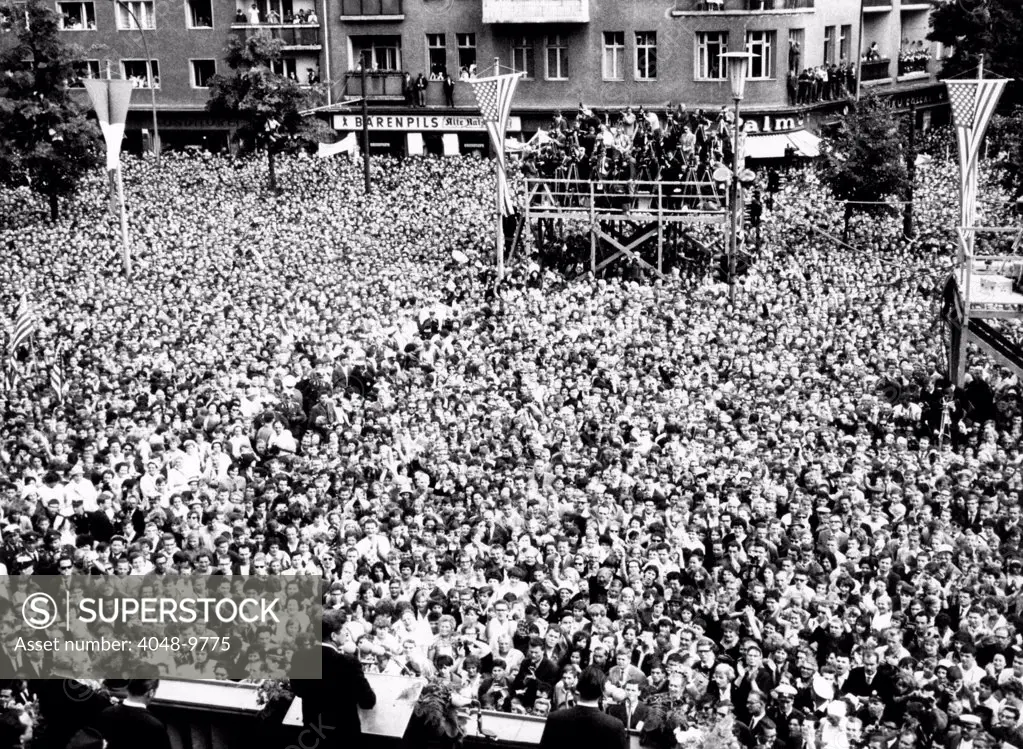 President Kennedy (left center foreground) tells the crowd in front of West Berlin City Hall that 'Ich bin ein Berliner' (I am a Berliner). June 26, 1963.