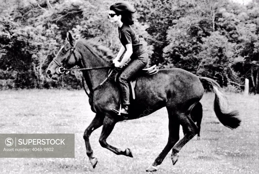 Jacqueline Kennedy, riding a horse in Waterford, Ireland where she was on vacation with her children. June 16, 1967.