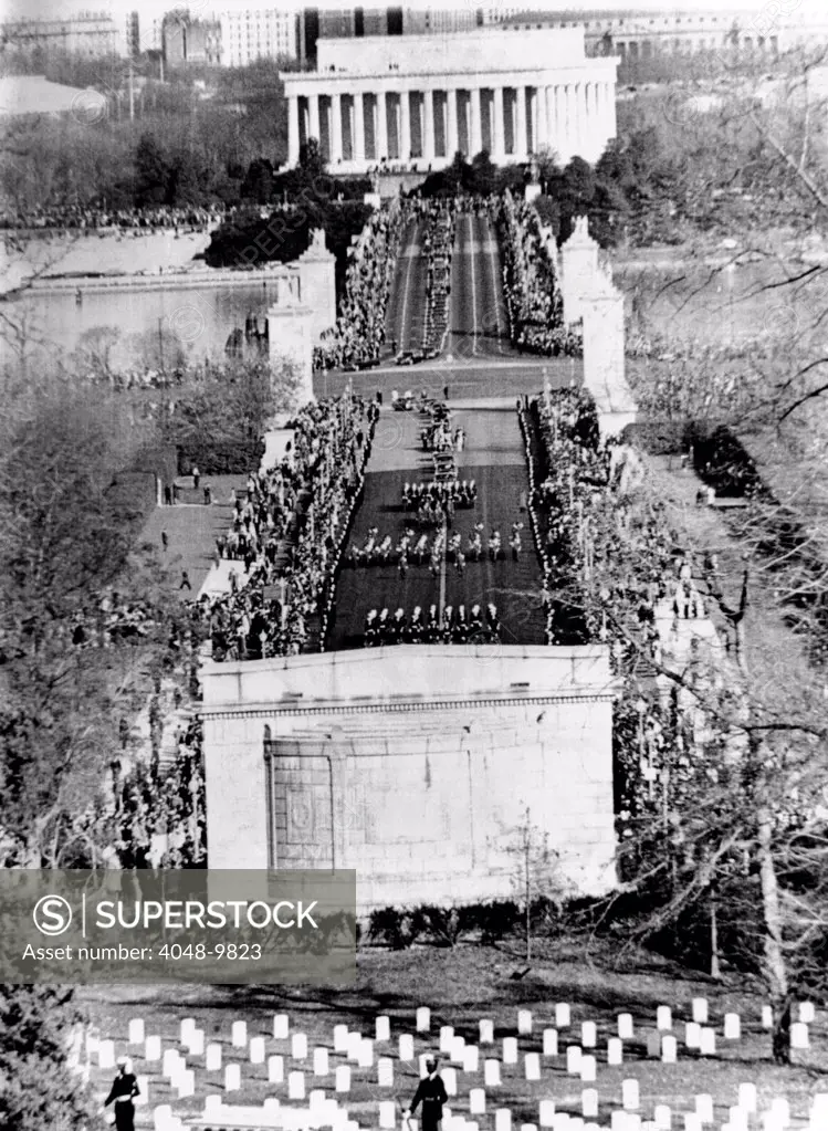 President John Kennedys funeral procession crossing the Memorial Bridge to Arlington National Cemetery. Nov. 25, 1963.