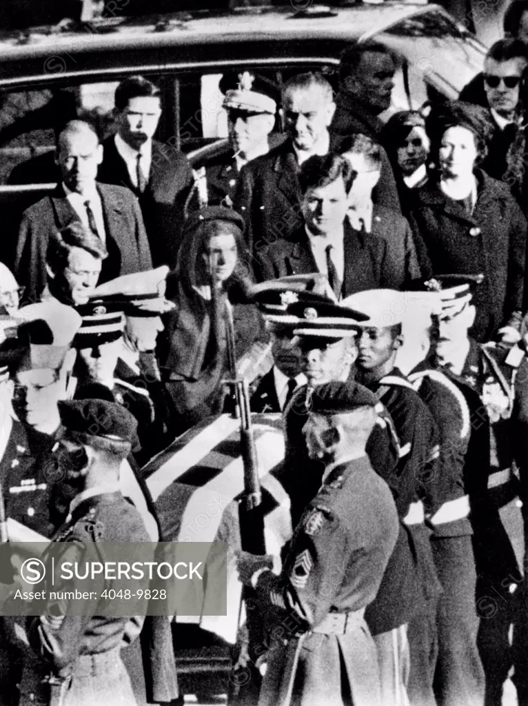 President Lyndon and Lady Bird Johnson behind Robert, Jacqueline and Edward Kennedy as the Kennedy funeral arrives for graveside services at Arlington National Cemetery. Nov. 25, 1963.