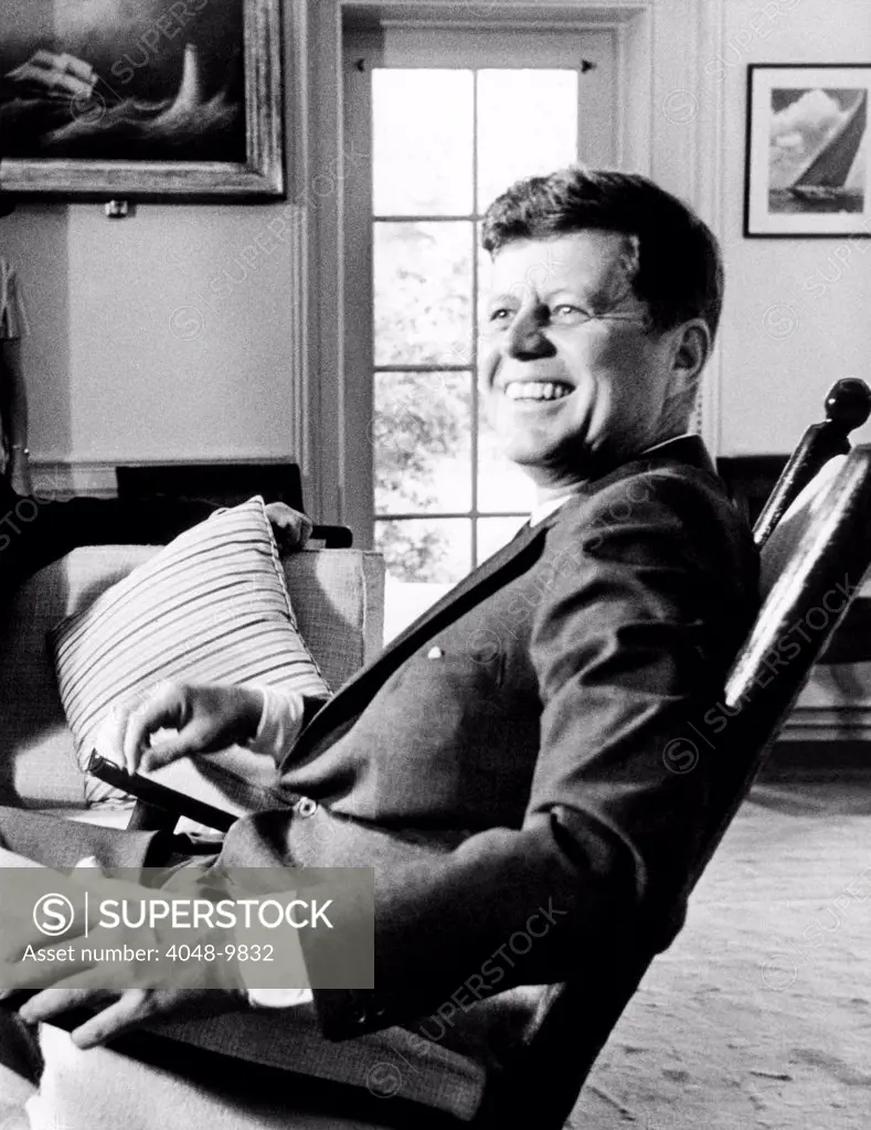 A relaxed President Kennedy sits in his rocking chair in the Oval Office of the White House on his 46th birthday. May 29, 1963.