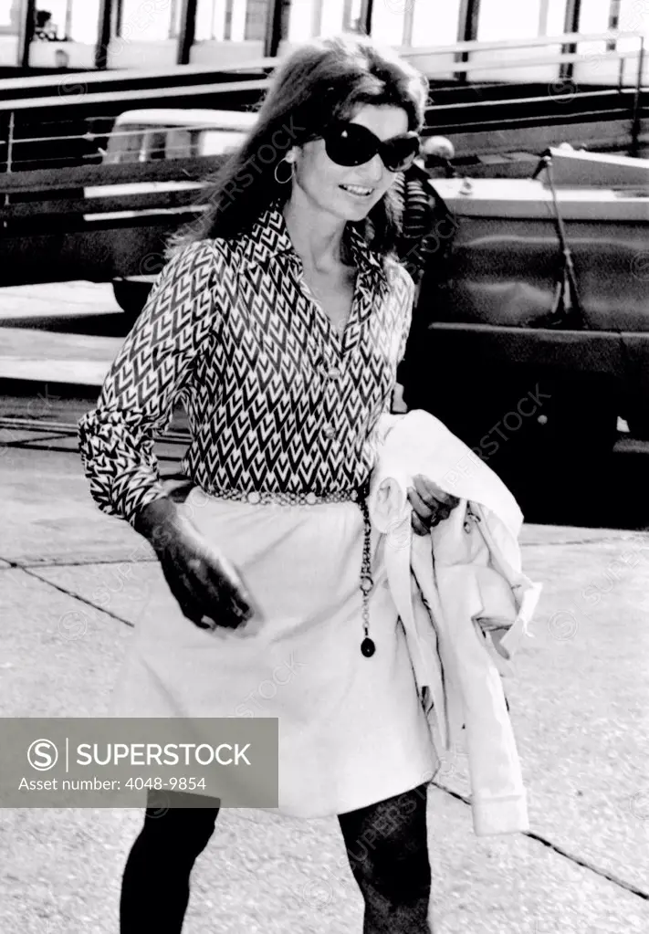 Jacqueline Kennedy Onassis walks through Romes Leonardo da Vinci Airport. She was traveling from New York to Athens. Aug. 18, 1970.