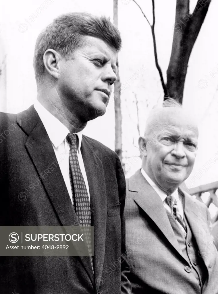 Presidents Dwight Eisenhower and John Kennedy meet after the failed Bay of Pigs invasion. Camp David, Maryland. April 22, 1961.