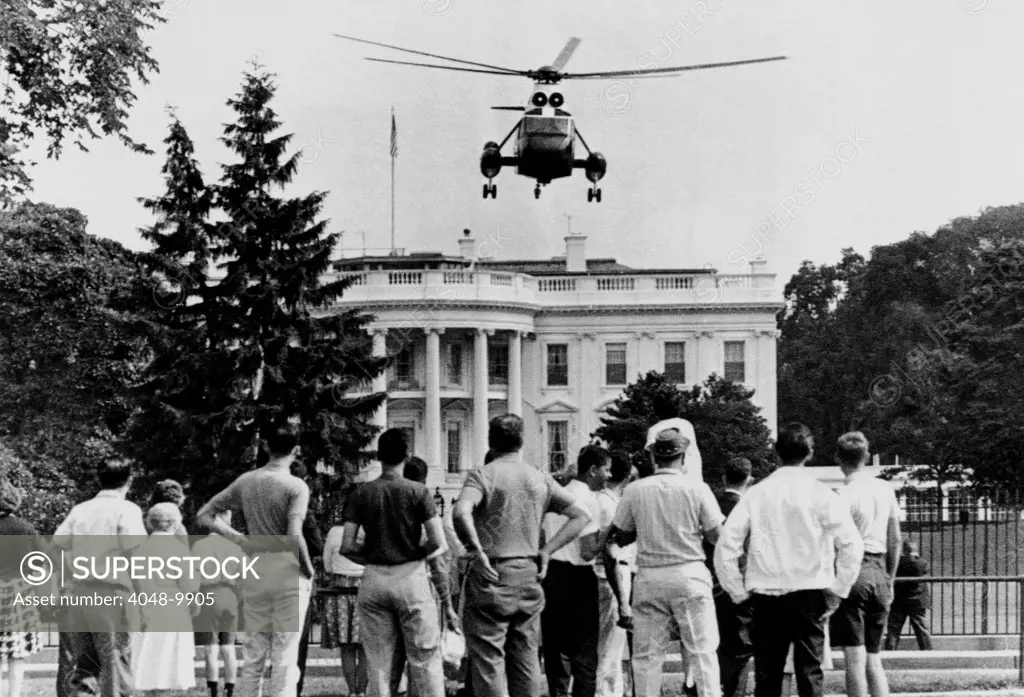 President John Kennedy's new helicopter takes off from the South Lawn. JFK flew over tourists on this way to the Governors' Conference in Philadelphia. July 4, 1962.