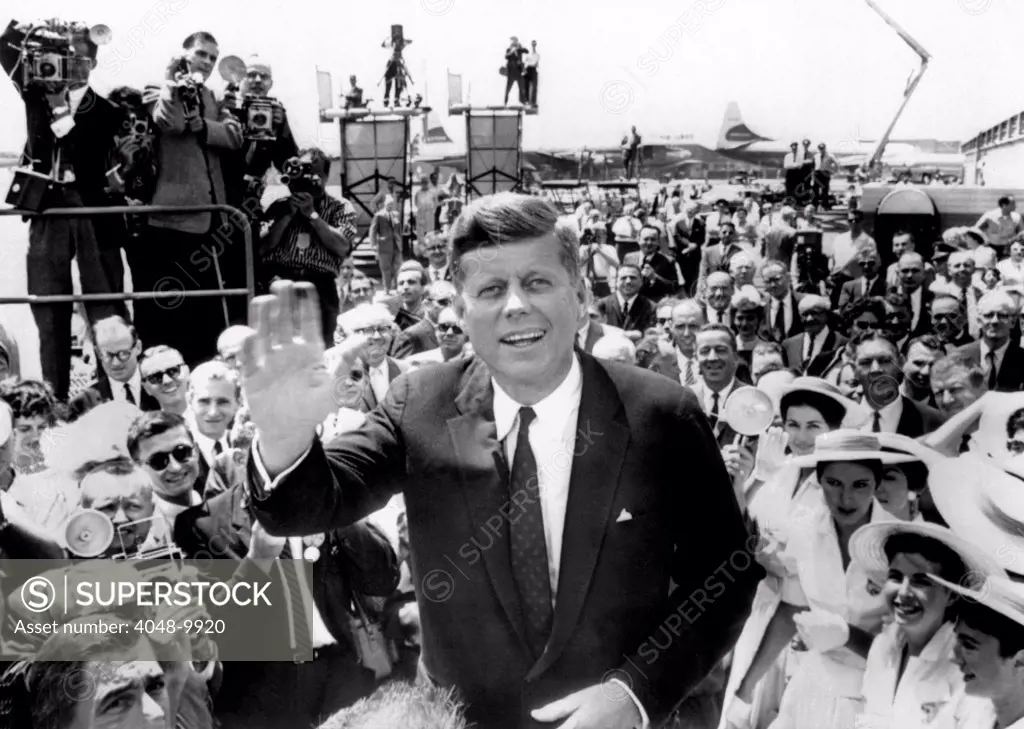 Sen. John Kennedy waves upon his arrival at Los Angeles International Airport for the 1960 Democratic Convention. He was the front runner for the nomination and was greeted by an estimated crowd of 2,000. July 9, 1960.