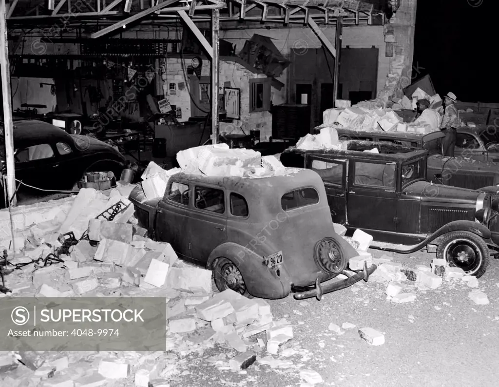 1933 Longbeach Earthquake damage. Southern California was hit by a magnitude of 6.4 Richter scale earthquake. Parked cars were damaged by falling masonry. Brawley, California, March 11, 1933.
