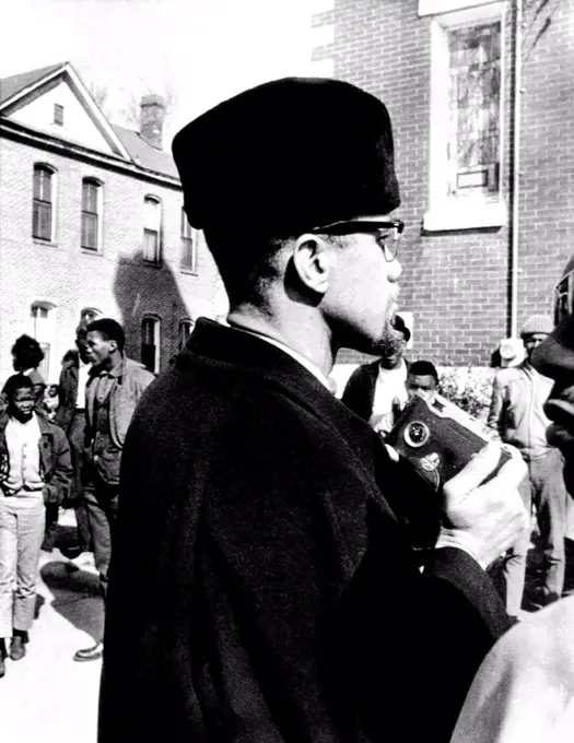 Malcolm X visits the voting rights protest in Selma, Alabama. He is about to photograph the church in which he spoke to protesters. Feb. 4, 1965.