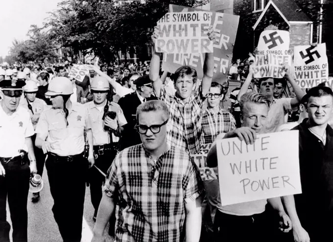 Counter demonstrators for 'White Power' in Gage Parks section of Chicago. 500 protesters opposed civil rights marchers seeking open housing in Chicago and its suburbs. More than 500 marchers participated. Aug. 14, 1966.