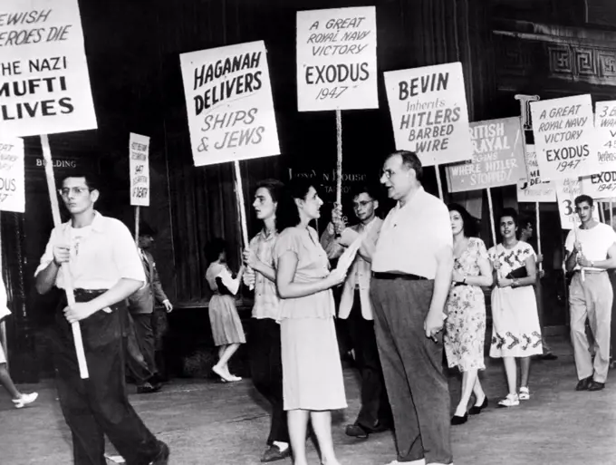 Pickets at the British Consulate in Chicago. They are protesting treatment of Jews taken off unsuccessful Palestine blockade runner Exodus 1947 and returned to Germany. 1960 war film 'EXODUS' was based on the subject of this protest. Sept. 10, 1947.