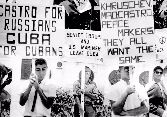 Counter protest against the 'Canada-to-Cuba' peace walkers. The Canadian peace walkers are members of the Committee for Non-Violent Action, are en route to Cuba from Quebec, Canada. May 29, 1964.