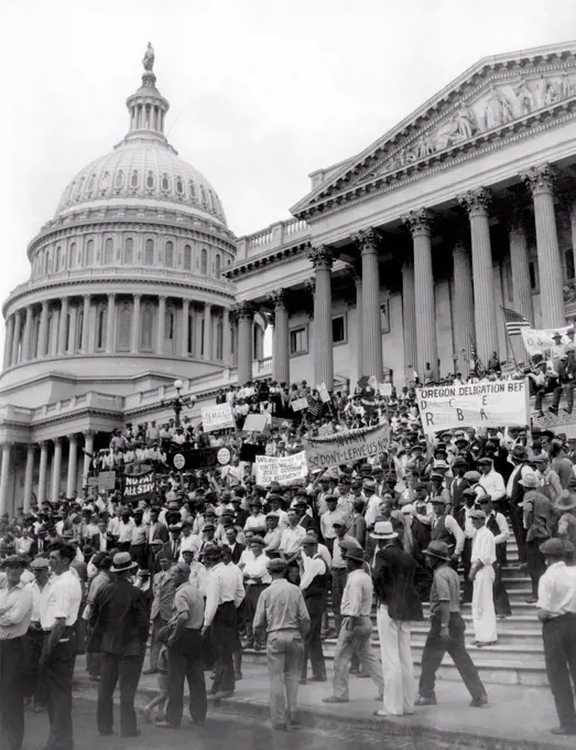 Bonus Army protests at the Capitol. 'Demand Congress Enact Relief Before Adjournment' reads one sign of Bonus Army Veterans. July 2, 1932.