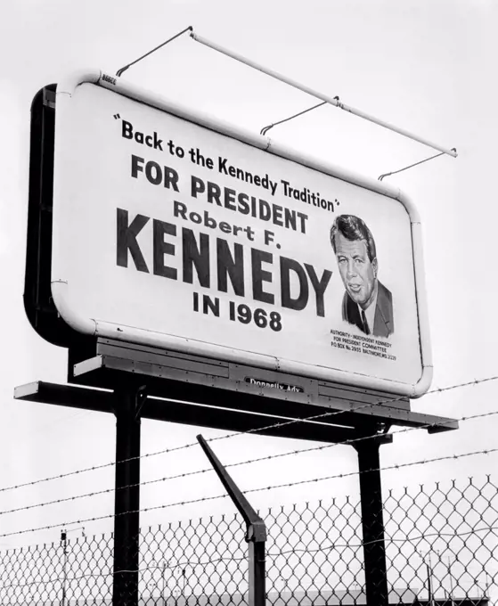 Unauthorized billboard promoting the 1968 presidential candidacy of Senator Robert Kennedy. The billboard was posted without the approval of Kennedy, who requested it be taken down. May 6, 1966.