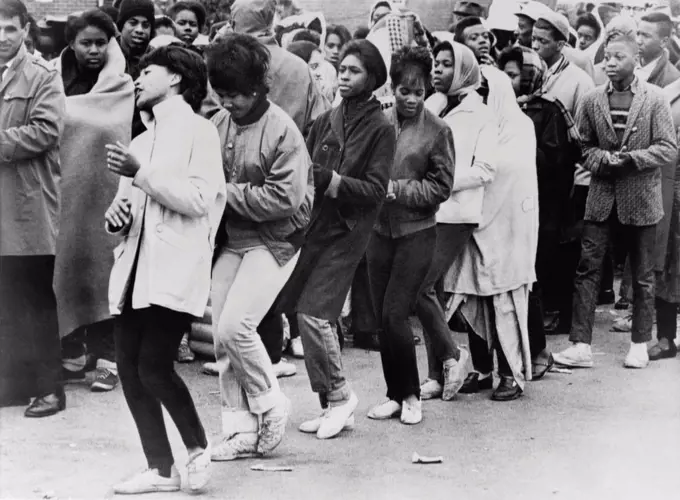 African American women dance at a civil rights demonstration. Over the first three weeks of March 1965, the Selma 'occupation' grew to 8,000 protesters, before they left on the Selma-Montgomery March of March 21.