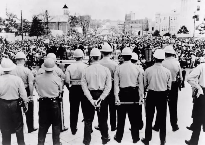 Selma to Montgomery March completed. Helmeted state conservation department agents with clubs stand on Alabama Capitol steps as 30,000 protester complete their march for Voting Rights. March 25, 1965.