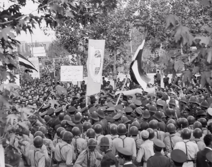 Iranian demonstrators protest against the British government in 1951. They were supporting the Iranian nationalized of the Anglo-Iranian Oil Company in March 1951. in 1953, British and American covert operations replaced nationalist Prime Minister Mohammed Mossadegh, with the more compliant Mohammad Reza Shah Pahlavi.