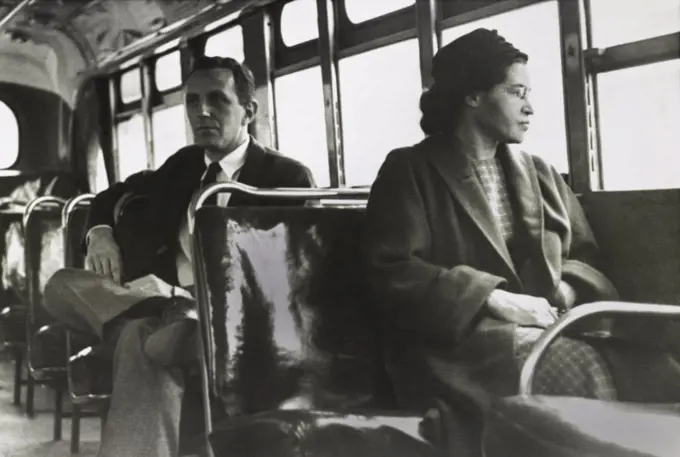 Mrs. Rosa Parks, 43, in a forward seat of a Montgomery, Alabama, bus on December 21, 1956. It was over a year earlier that the African American NAACP activist ignited off the Montgomery Bus Boycott on Dec. 1, 1955, by refusing to give her seat in the Negro section of the bus, to standing white passenger  (BSLOC_2020_2_86)