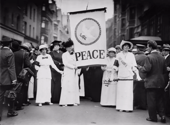 American womens peace parade in New York City, shortly after the start of World War I. On Aug. 29, 1914, they marched down Fifth Avenue, led by Chief Marshal Portia Willis FitzGerald (on right), called Prettiest Suffragette in New York State (BSLOC_2017_1_63)