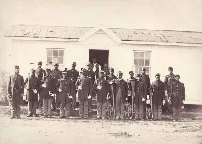 The Civil War, group of 21 African American men holding musical instruments, title: 'Band of 107th U.S. Colored Infantry', Arlington, Virginia, photograph by William M. Smith, 1865.