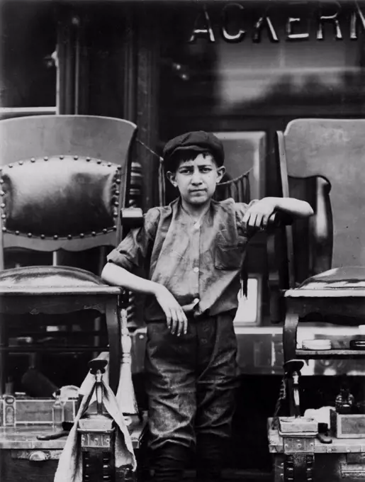 Frank Villanello, 21 Greenwich Avenue, Father's shoe-shine stand, New York City, photograph by Lewis Wickes Hine, July, 1910